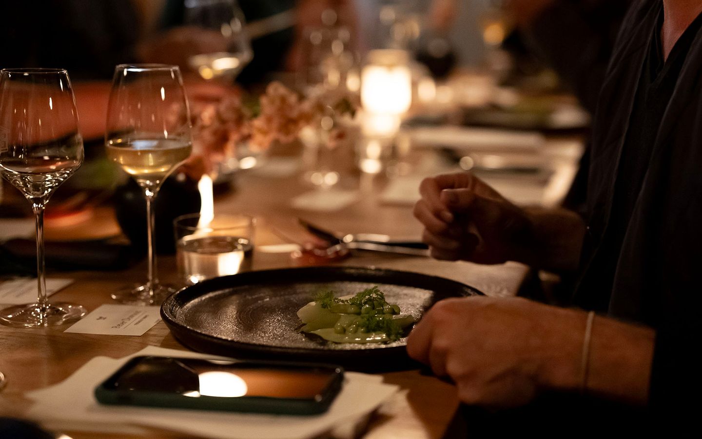 Woman eating at the Old Mill Restaurant.
